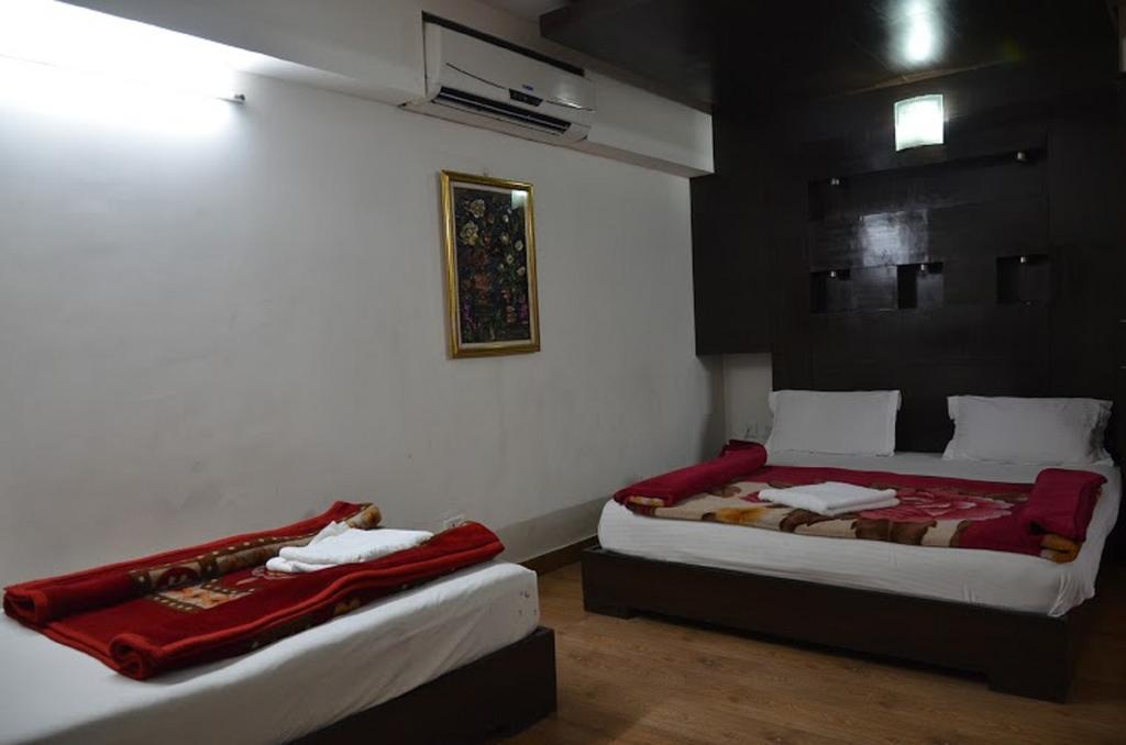 Hotel Durga International New Delhi Rum bild